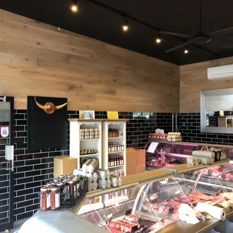 Timber wall cladding behind a deli counter