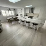 Glacier Stone AB grade oak in a kitchen and dining room with white joinery
