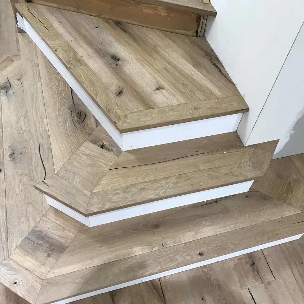 Close view of oak stair treads with mitred nosings