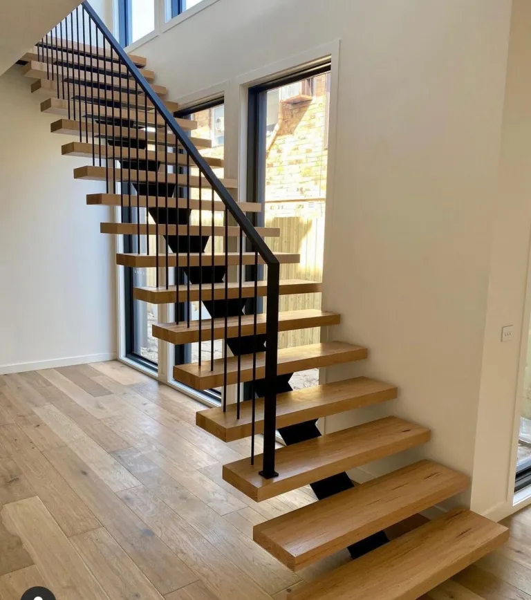 Beaumont Oak floating staircase with a black stringer