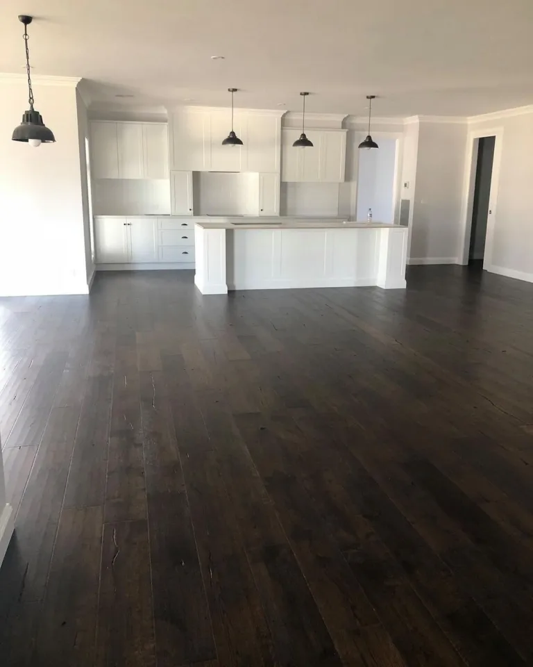 Dark oak floor across a newly finished open-plan room