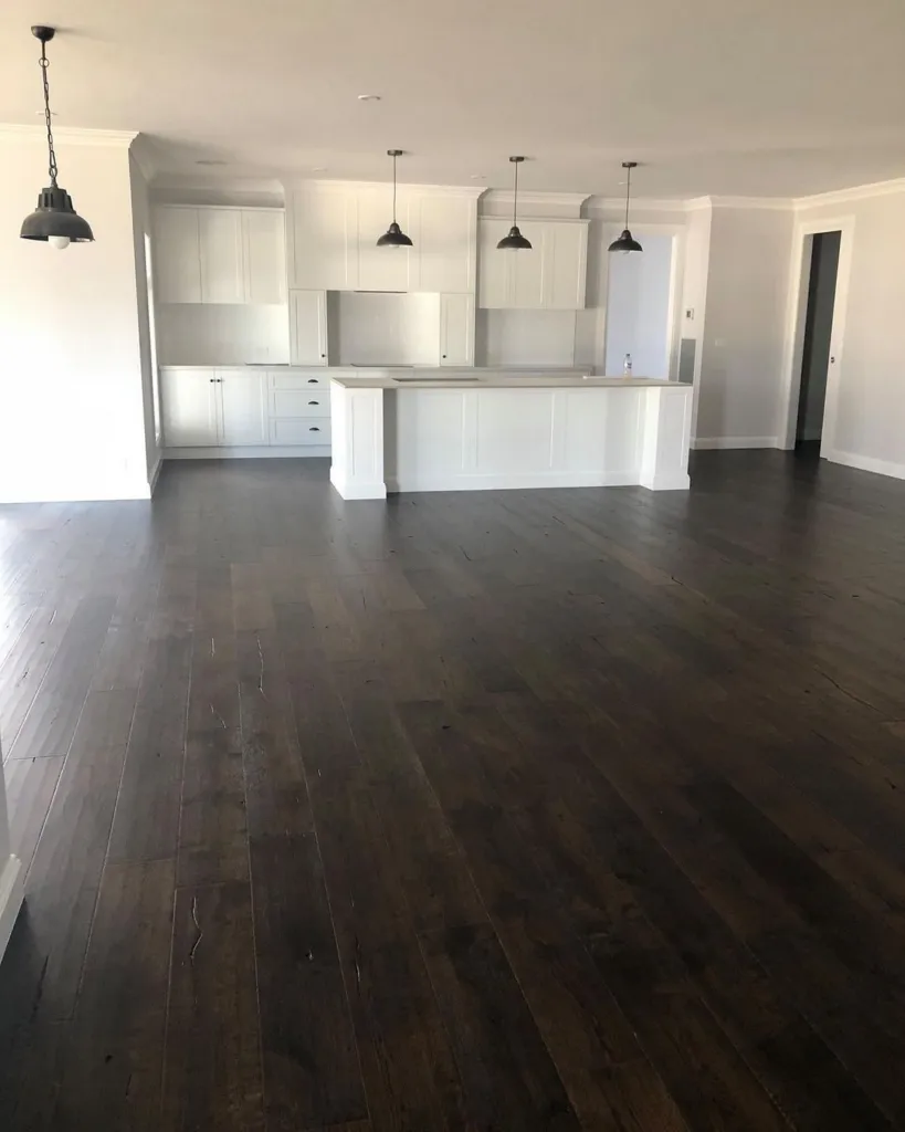Dark oak floor across a newly finished open-plan room