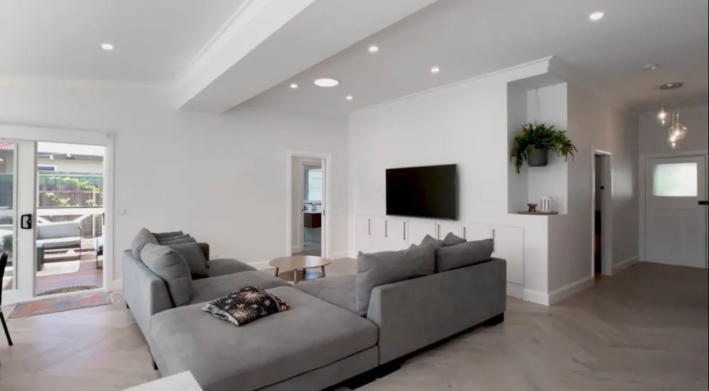 Vermont Oak herringbone living room looking towards the entry